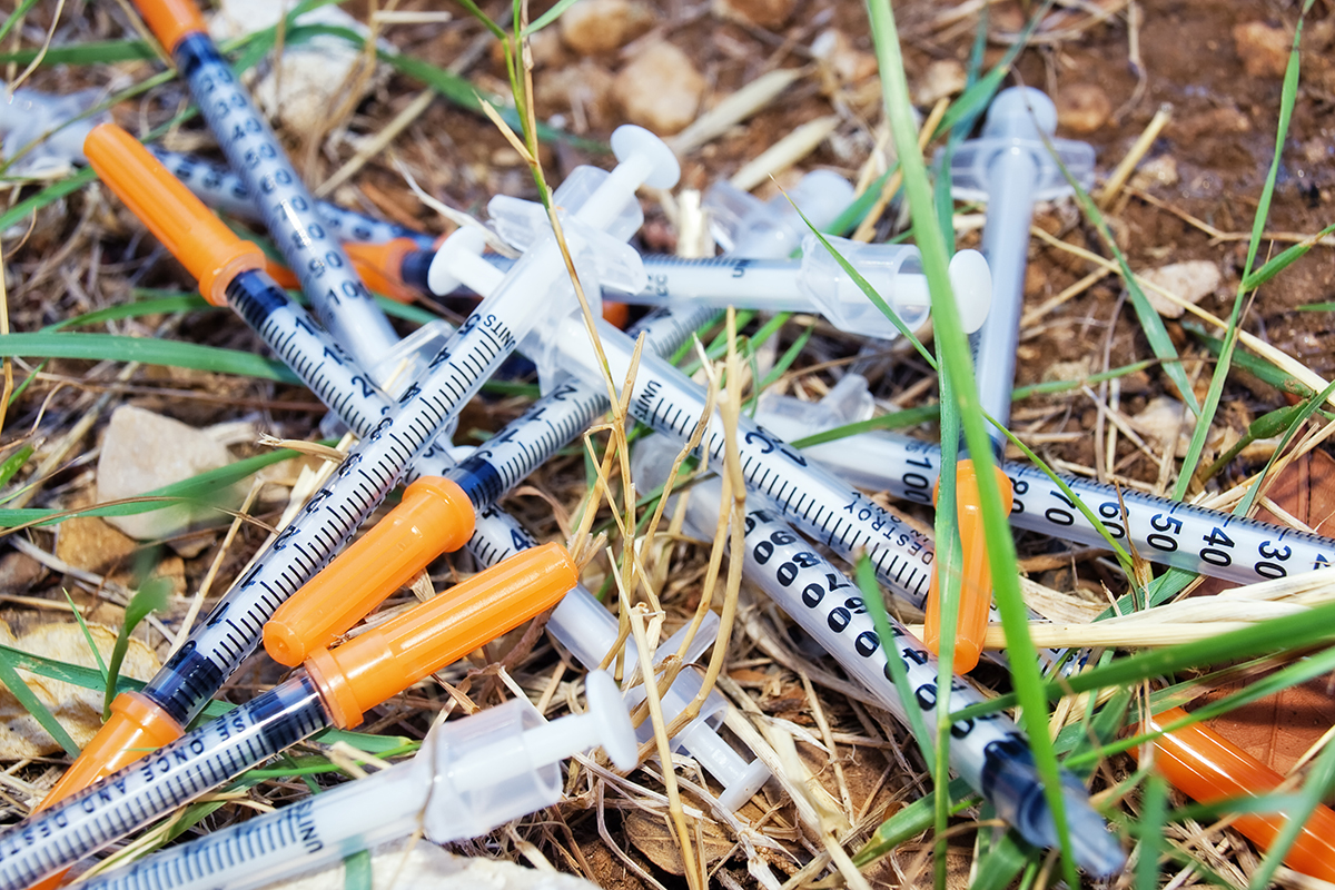 Syringes in grass
