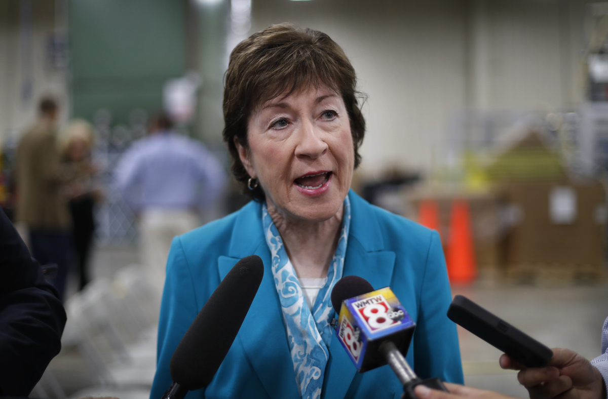 U.S. Sen. Susan Collins, R-Maine, attending an event in Lewiston, Maine, Thursday, Aug. 17, 2017, speaks to reporters about President Donald Trump's recent comments about the violence in Charlottesville, Va. Collins criticized Trump for failing to speak forcefully against racism, bigotry and anti-Semitism "from the very beginning," and said she doesn't understand why he backtracked on a forceful statement against racism earlier in the week. (AP Photo/Robert F. Bukaty)