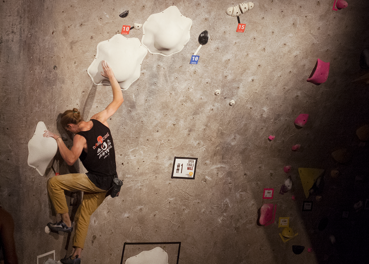 Alex Assesano climbs indoors