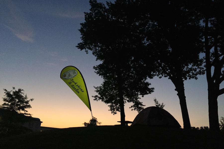 Silhouette of tree and camping tent against sky, Berkshires to Boston sign