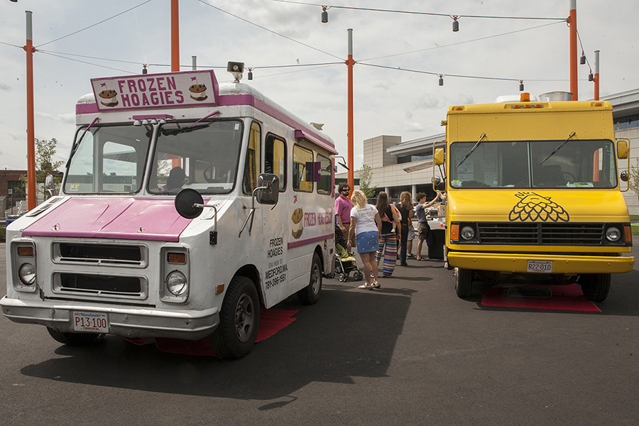 Frozen Hoagies and Chicken & Rice Guys food trucks parked at the Lawn on D in South Boston