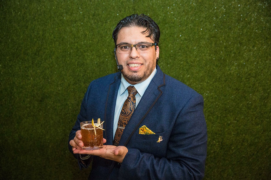Moe Isaza with his winning cocktail, Poderoso, at the Bacardi Legacy U.S. Cocktail Competition in Miami