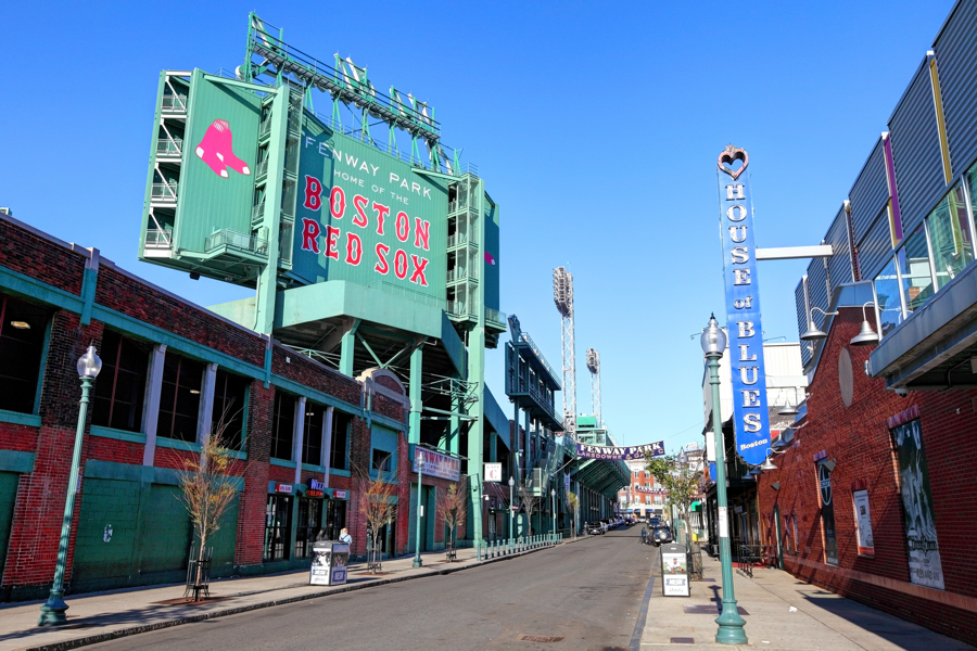 Boston, Massachusetts, USA - April 24, 2016: Daytime view of Fenway Park and the House of Blues along Landsdowne Street in the Fenway–Kenmore neighborhood.