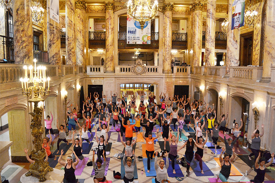 the Wang Theatre hosted a yoga class in their grand lobby last year, and this year they're hosting a barre class