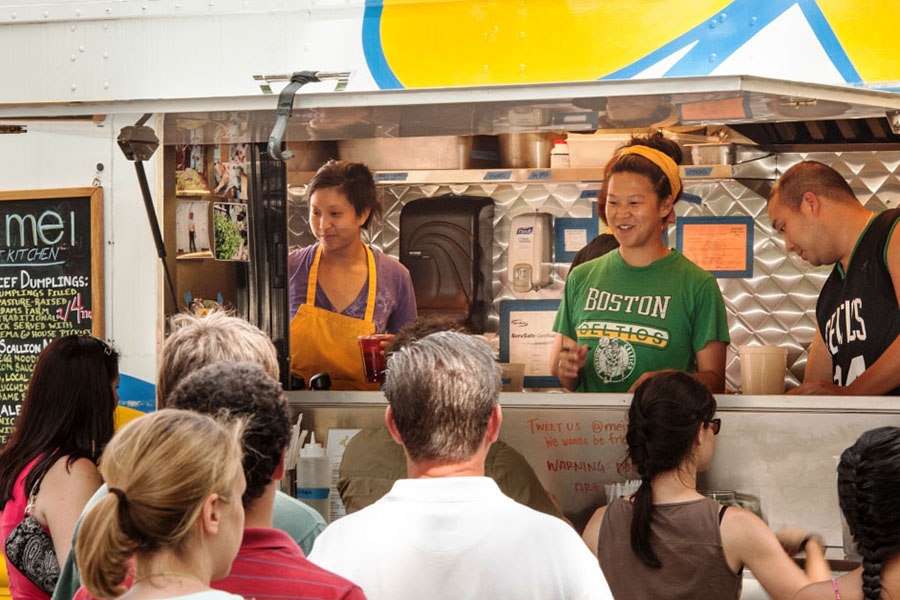 (L to R) Irene, Mei, and Andy Li serving from the Mei Mei food truck c. 2013.