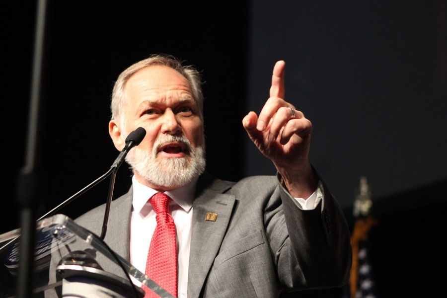 Scott Lively speaks at a microphone