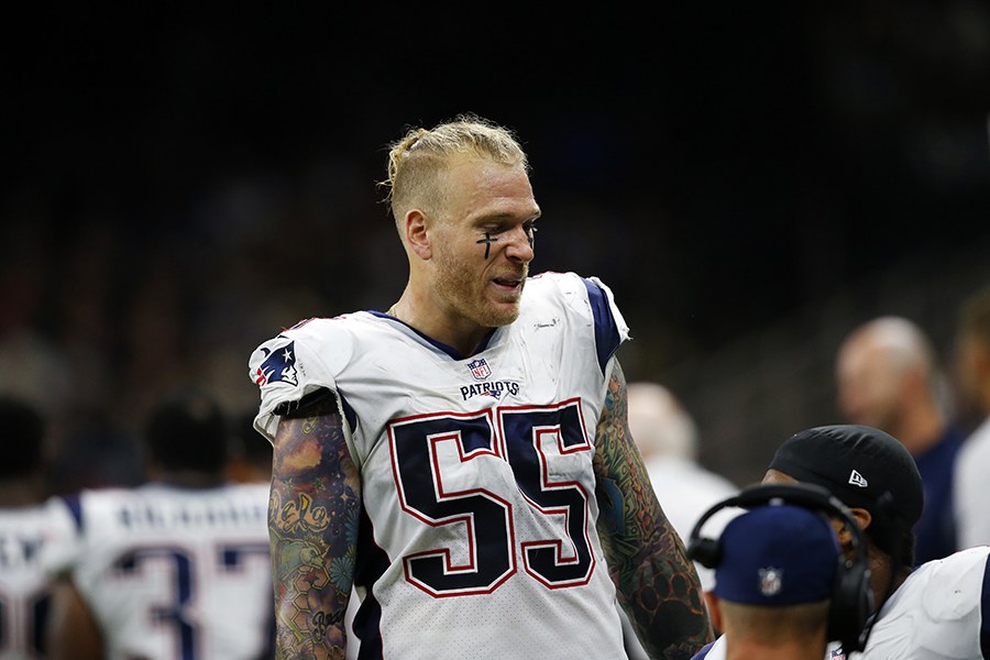 Cassius Marsh on the sidelines of a Patriots game with his helmet off