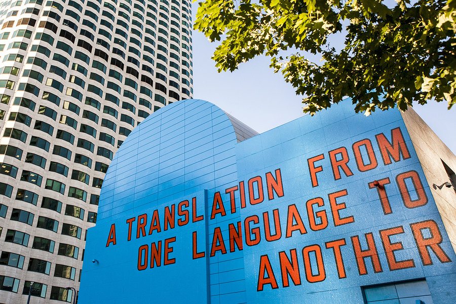 A gate that says "A translation from one language to another"