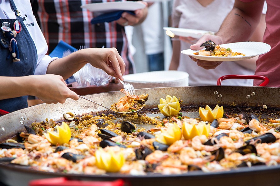 Paella is on the patio at Pagu this Independence Day