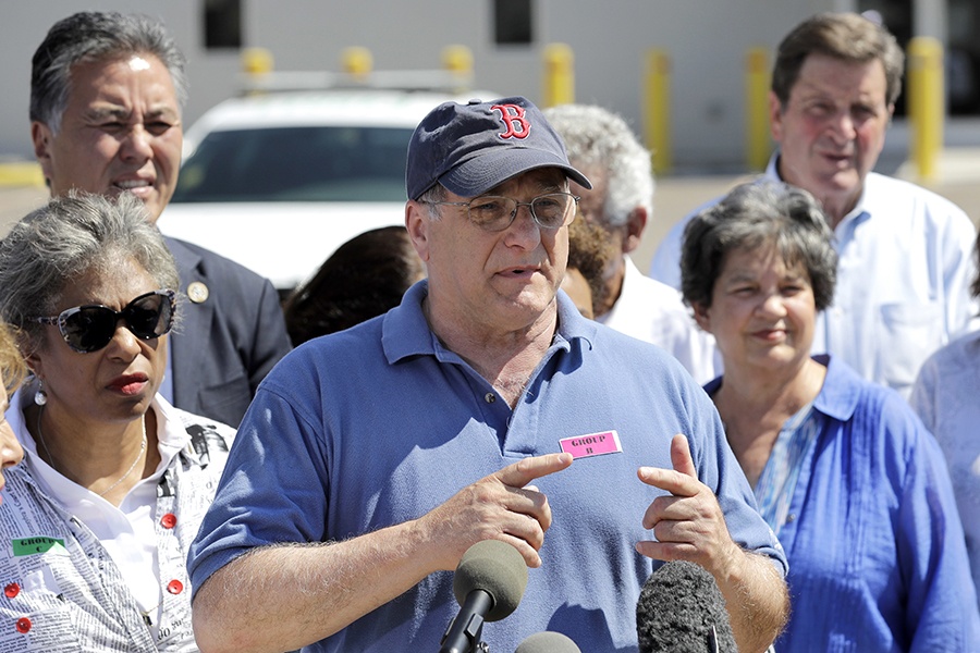 In this Saturday, June 23, 2018, photo, U.S. Rep. Mike Capuano, D-Mass., speaks after touring the U.S. Border Patrol Central Processing Center in McAllen, Texas. Capuano was part of a Congressional delegation visiting sites along the U.S.-Mexico border