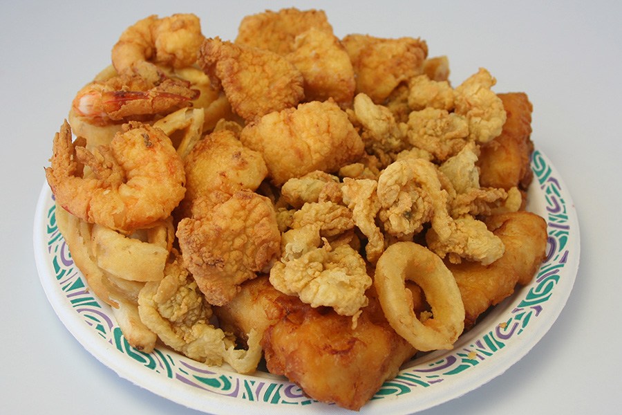 Fisherman's Platter featuring fried haddock, shrimp, scallops, calamari and French fries