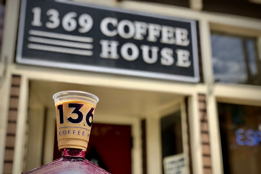 Ice coffee in front of 1369 Coffee House in Inman Square