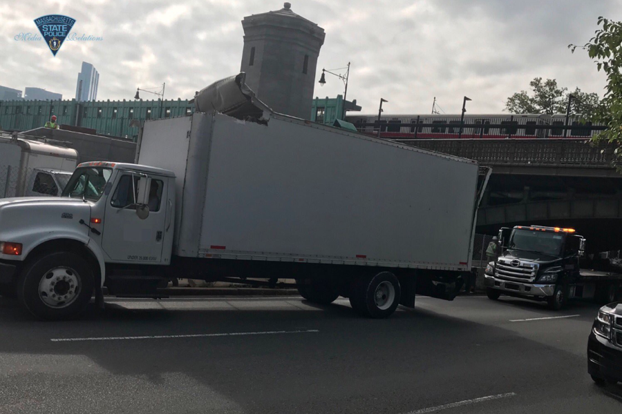 box truck storrowing at the longfellow bridge