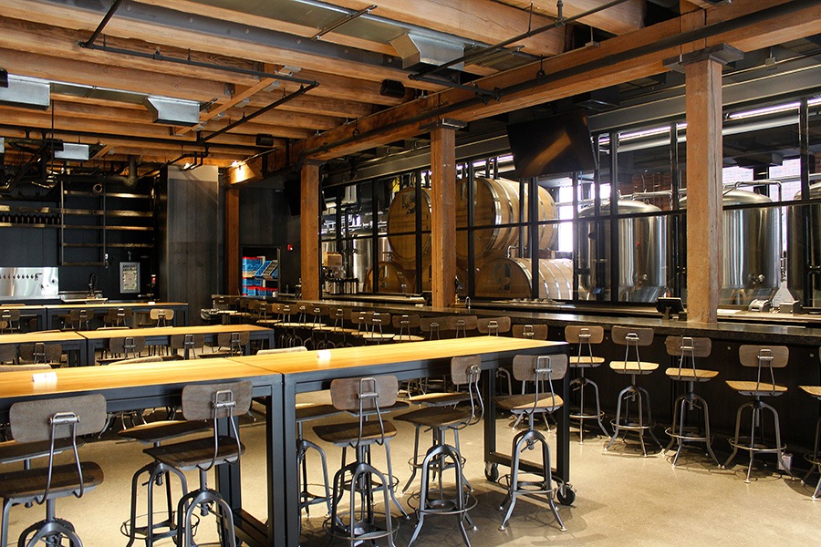 The Trillium Fort Point taproom overlooks the active brewery and retail area.