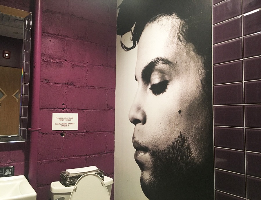 One of four single restrooms at Idle Hour is Prince-themed