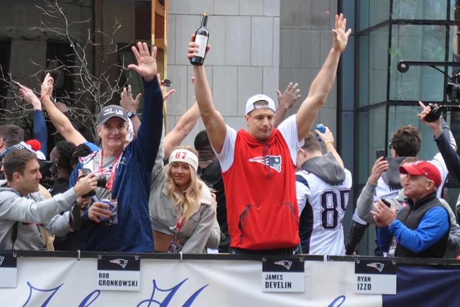 Rob Gronkowski (in red) was drinking a high-end bottle of wine from Hundred Acre Wines during the Super Bowl Victory Parade in Boston. 