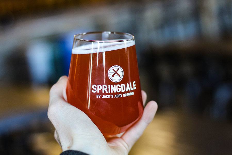 a glass of Casey's Beet Beer by Springdale 