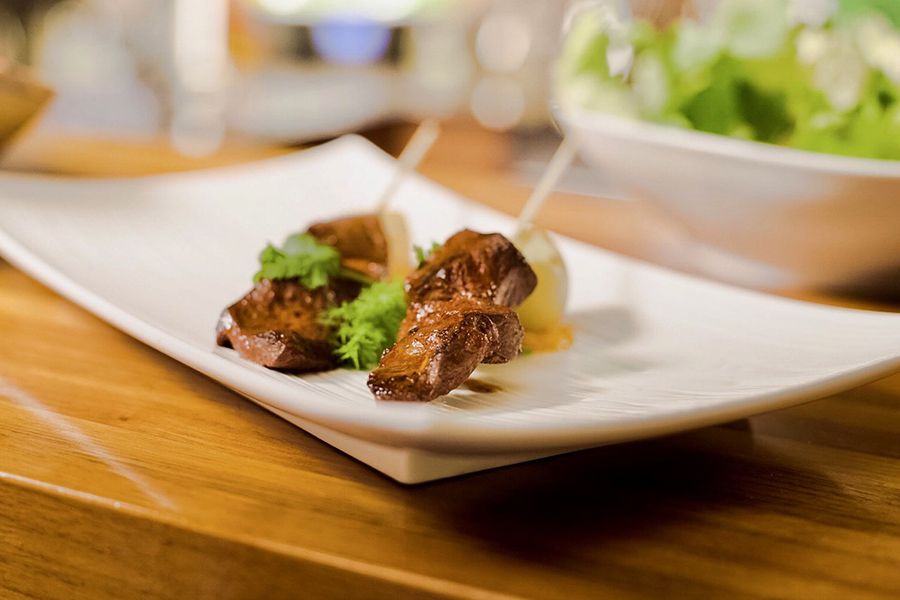 Anticucho de Corazón, (marinated beef heart skewers)