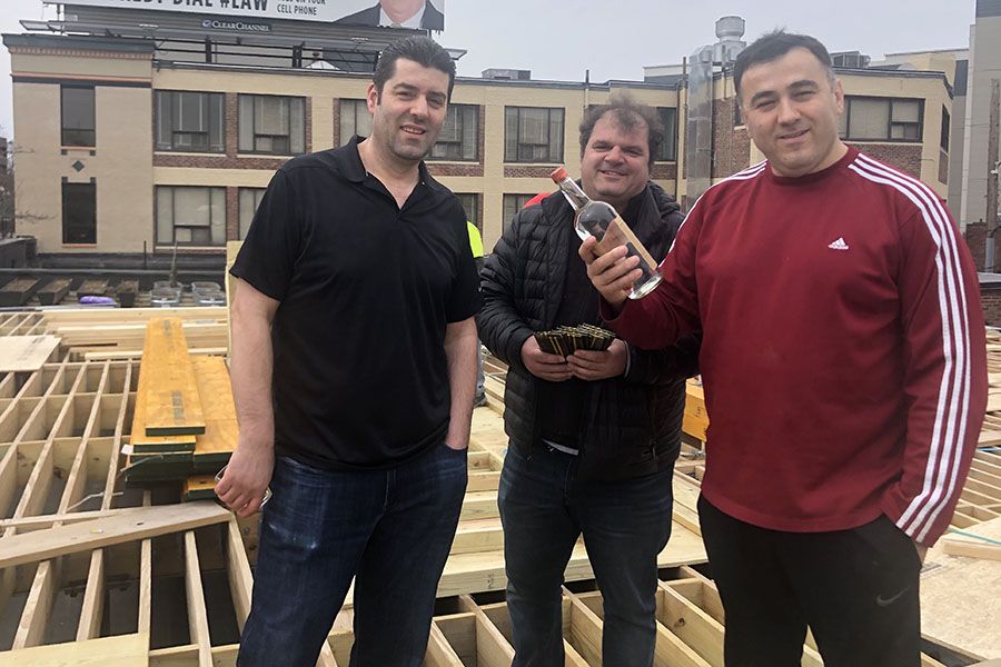 (L to R) Alba bar manager bar manager Leonard Kacaj, contractor and former Anthony's Pier 4 manager Peter Qirici, owner Leo Keka.