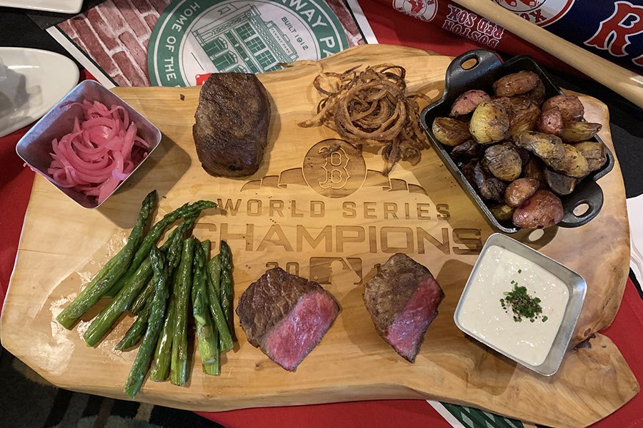 Fans with access to Fenway Park's exclusive Dell/EMC Club can dine on Savenor's steaks.