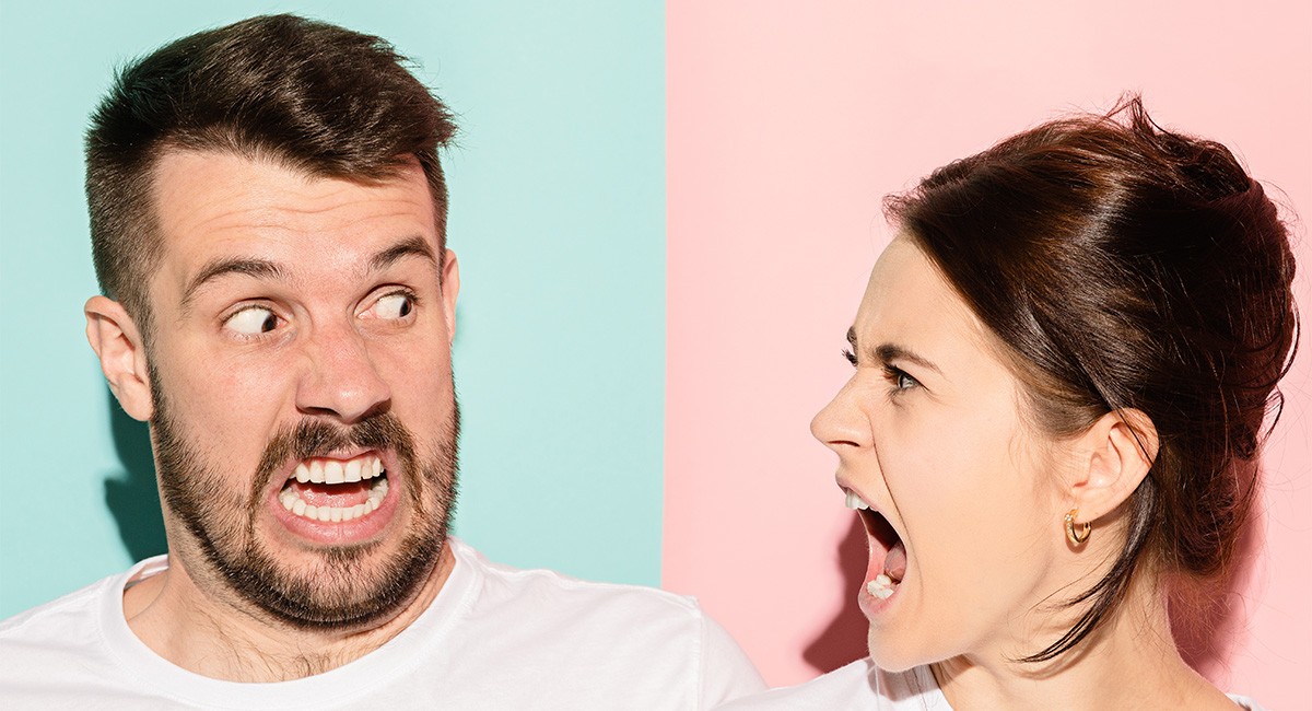 angry man yelling at woman