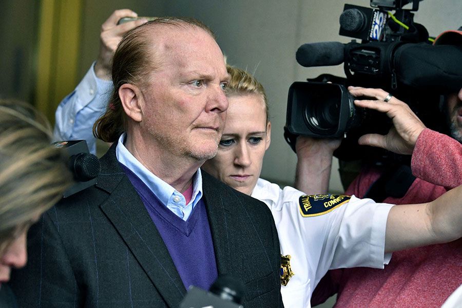 Chef Mario Batali departs after pleading not guilty, Friday, May 24, 2019, at municipal court in Boston, to an allegation that he forcibly kissed and groped a woman at a Boston restaurant in 2017