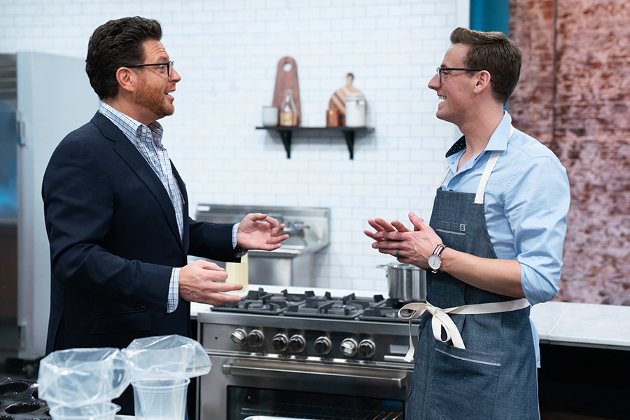 Best Baker in America host Scott Conant and contestant Joshua Livsey during a skills challenge, as seen on Best Baker in America, Season 3