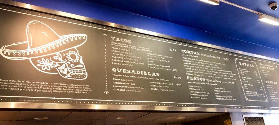 The menu board at Taqueria el Barrio in Boston
