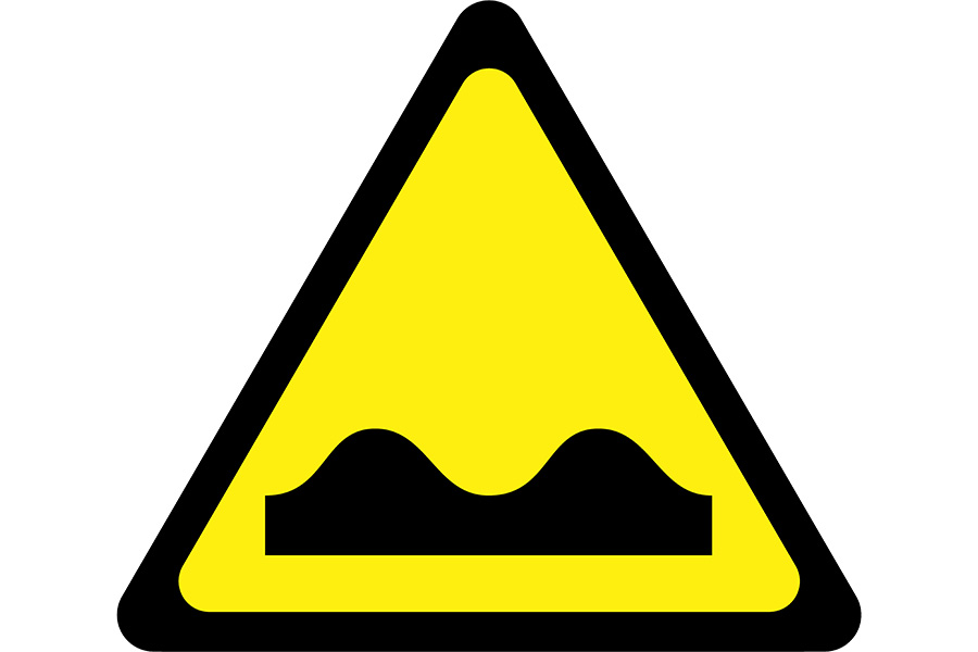 road sign with bumps