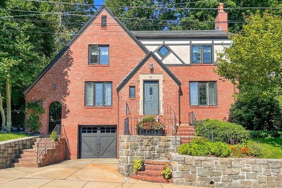 On the Market: A Tudor-Style Home in Moss Hill with an Outdoor Fireplace
