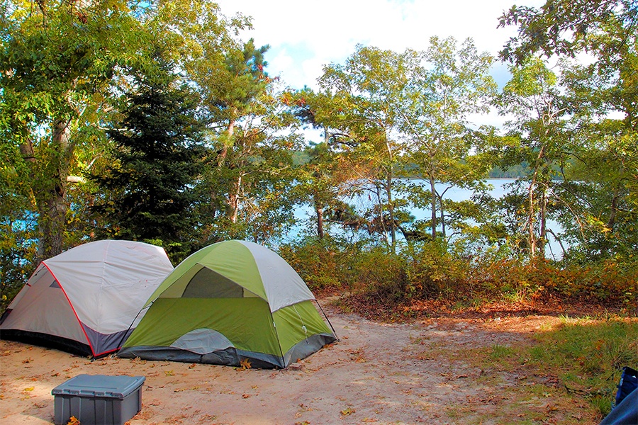 campsite next to a lake