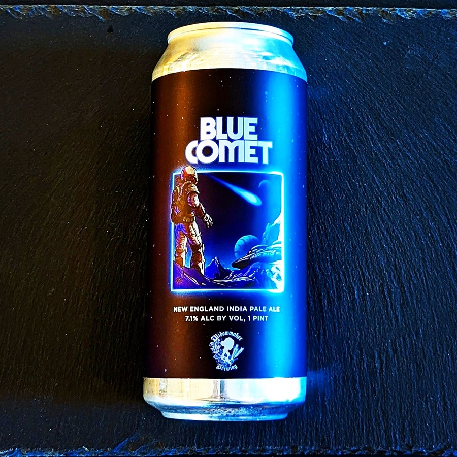 A beer can labeled Blue Comet features space-themed art.