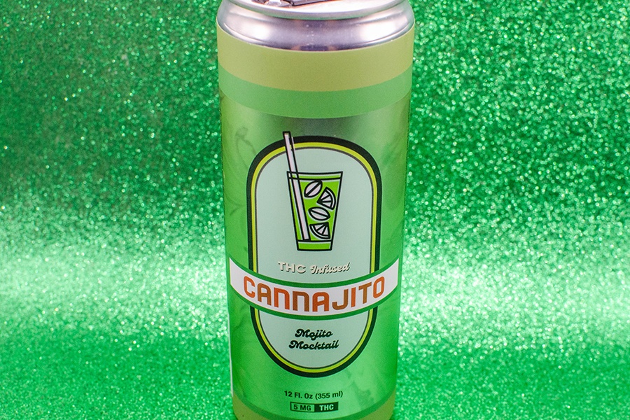 A green can of a THC-infused mojito mocktail is displayed on a sparkly green background.