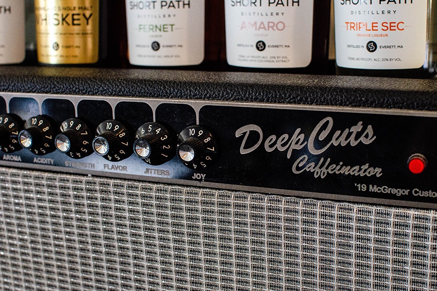 A custom amp has coffee-related words on it, like aroma, jitters, and acidity.