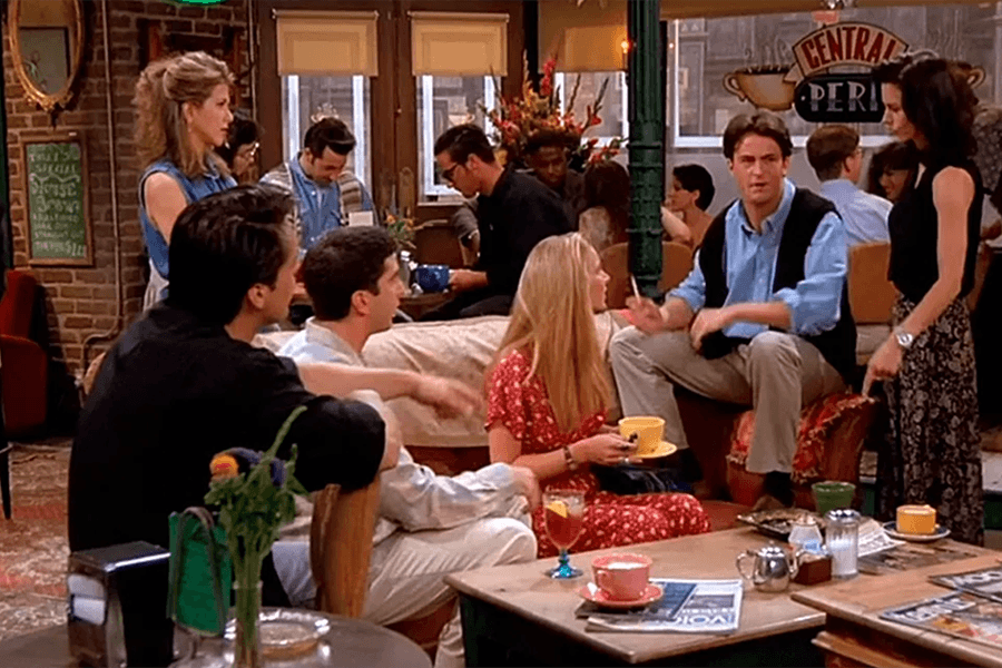 Screenshot of the cast of Friends sitting around in Central Perk.