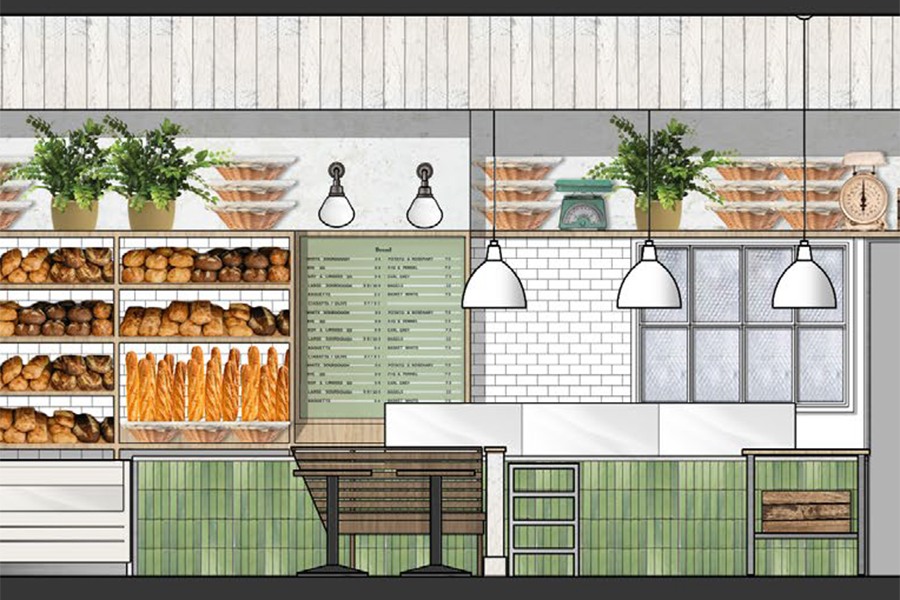 A rendering of a casual bakery and cafe features a mix of green vertical tiling, white subway tiling, potted plants, and shelves of breads.