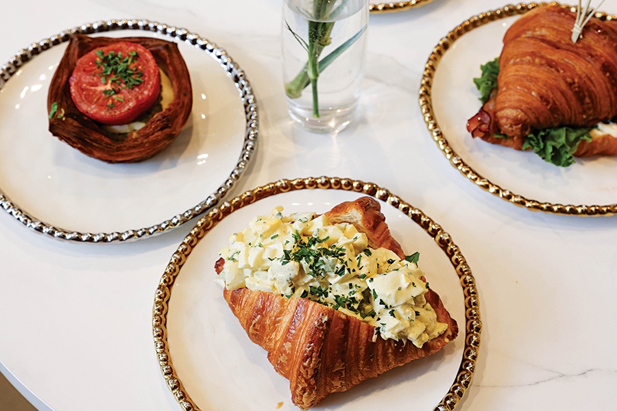 An egg-stuffed croissant, a tomato-topped pastry, and more.