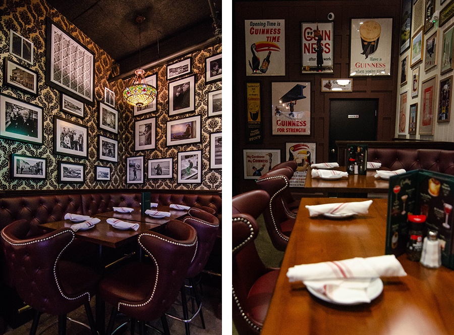 Irish pub interior featuring lots of Guinness posters and old photographs.